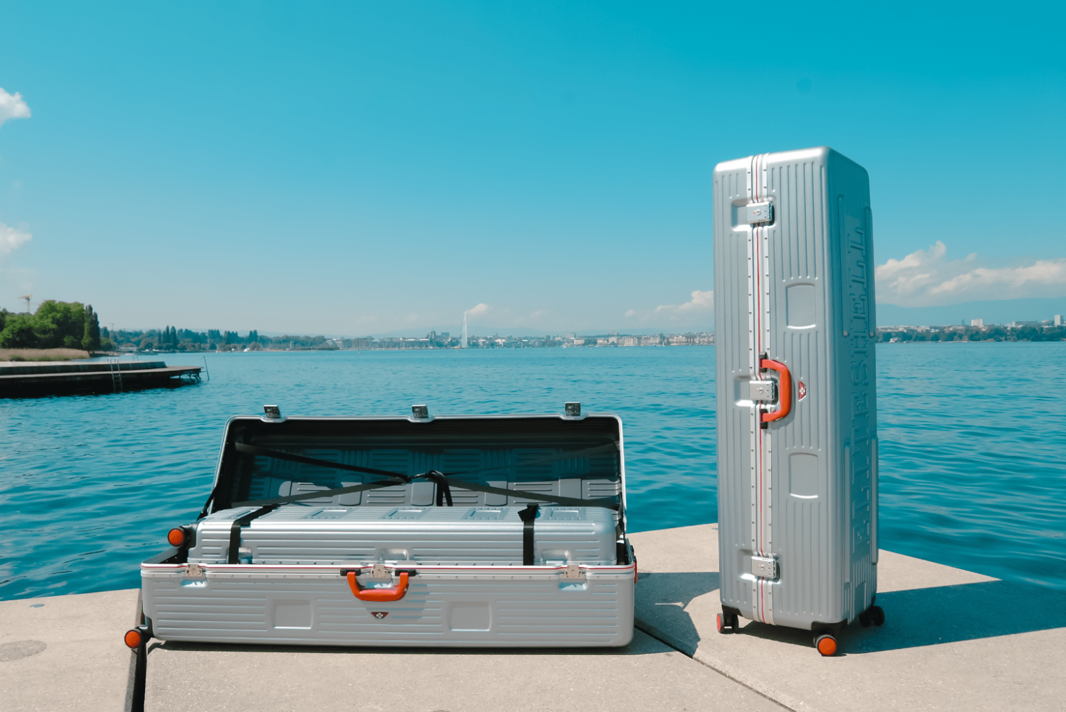 Les valises grand format d'Eliteshell devant le lac Léman à Genève